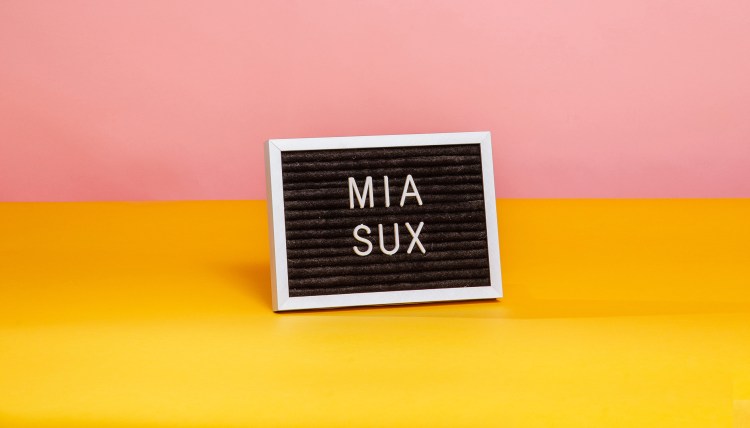 mia sux letter board sign
